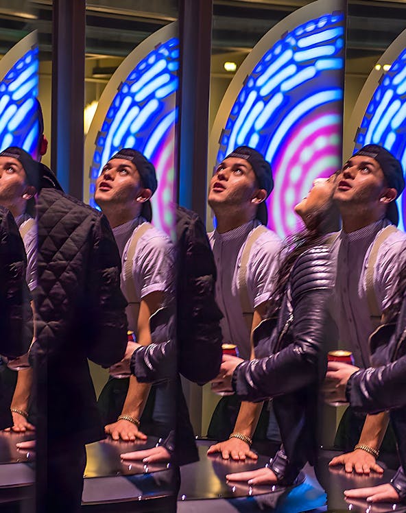 Visitors engaging with interactive exhibit at San Francisco Exploratorium.