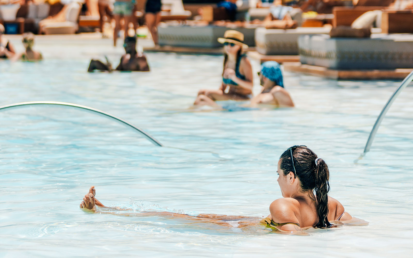 People relaxing in a pool at Terra Solis resort.