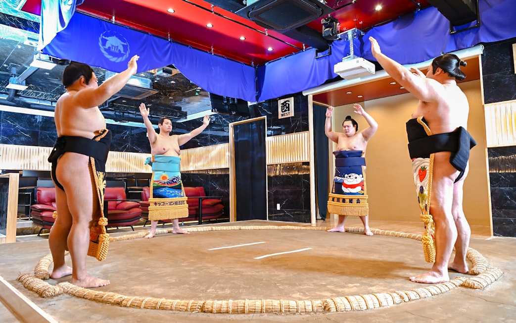 Sumo wrestlers practicing at Asakusa Sumo Club, Tokyo.