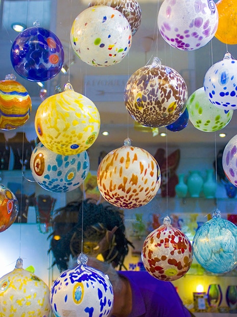 Colorful glass ornaments displayed at Murano Glass Museum, Venice.