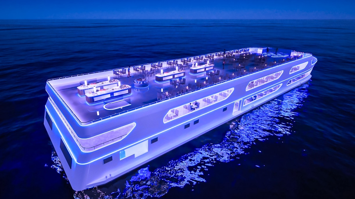 Luxury dinner cruise ship illuminated at night on the Chao Phraya River, Bangkok.
