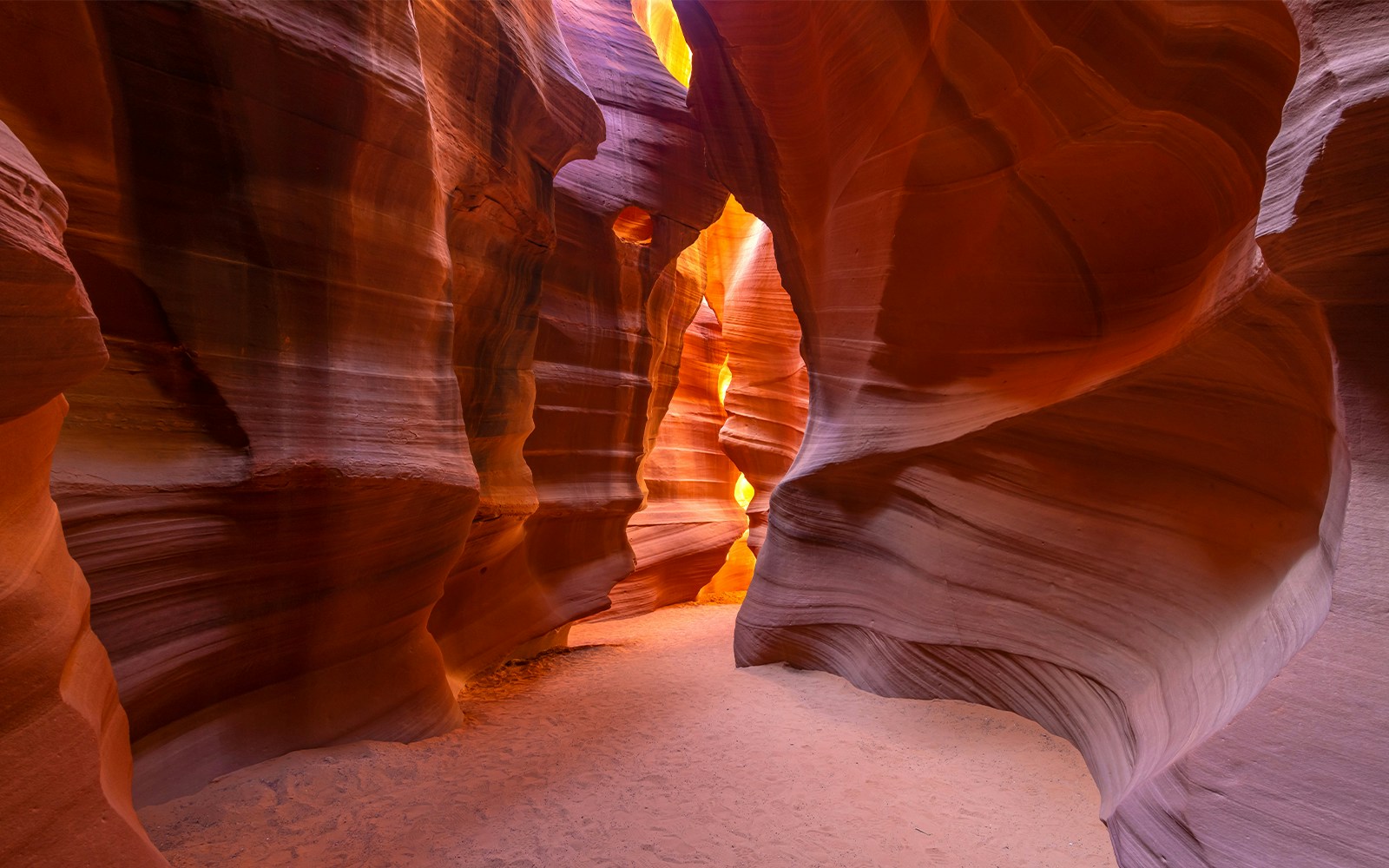 Upper Antelope Canyon sandstone formations with sunlight beams in Page, Arizona.