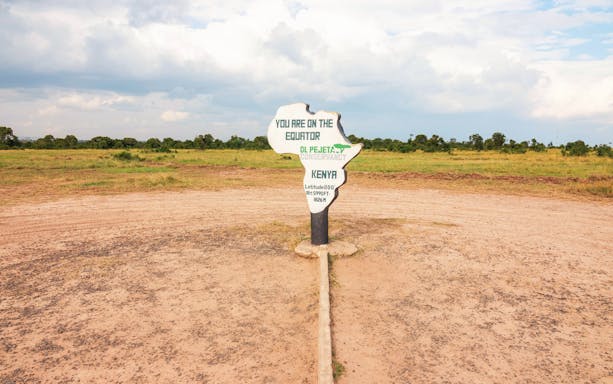Equator sign at Ol Pejeta Conservancy, Nanyuki, Kenya, marking the equatorial line.