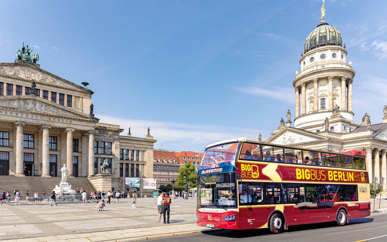 Hop-on hop-off bus in front of Konzerthaus Berlin and French Cathedral, Berlin tour.