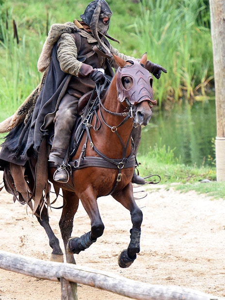 Medieval knight on horseback at Puy du Fou Theme Park.