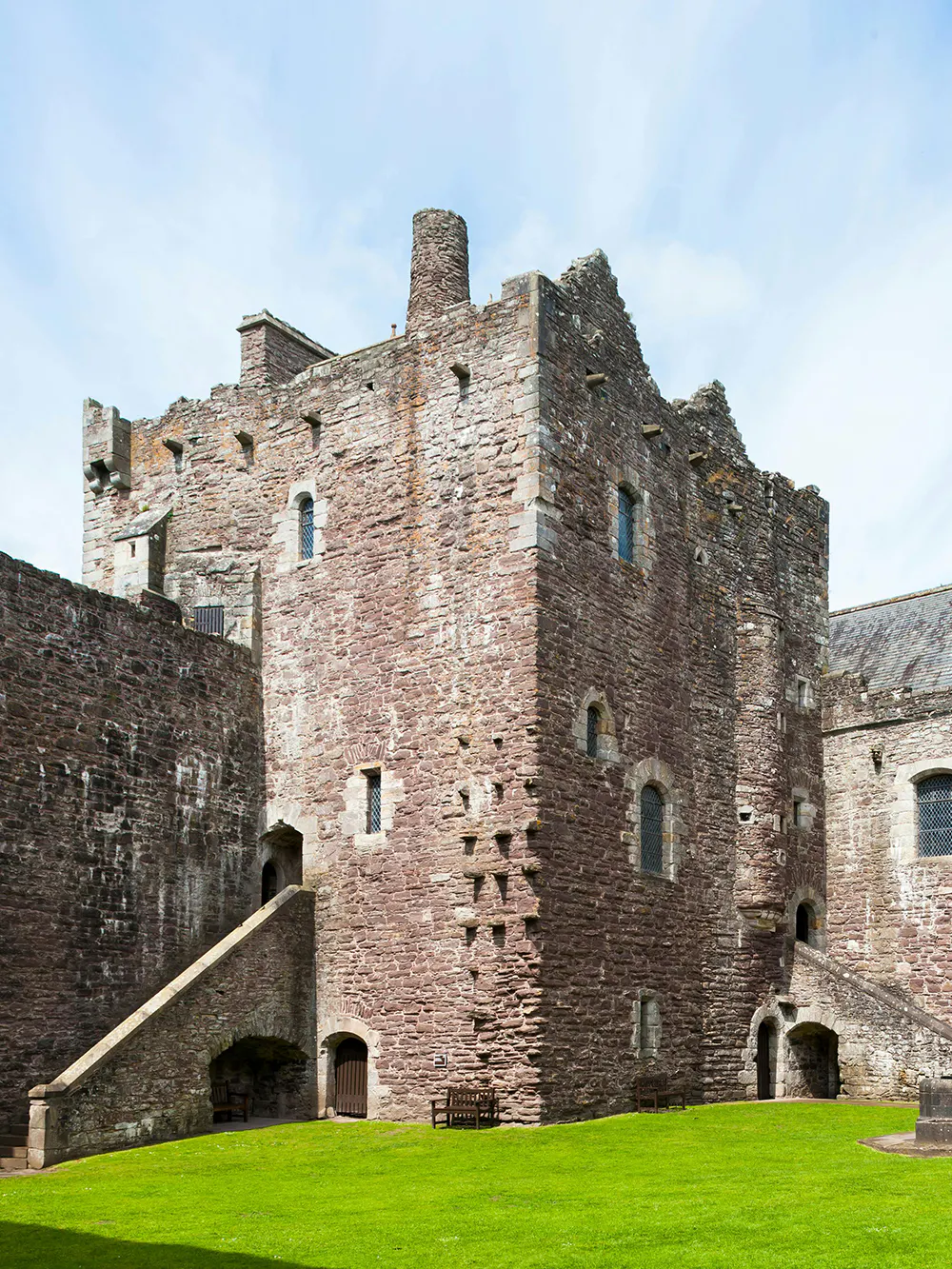 Doune Castle stone exterior with green lawn, Stirlingshire, Scotland.