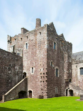 Doune Castle stone exterior with green lawn, Stirlingshire, Scotland.