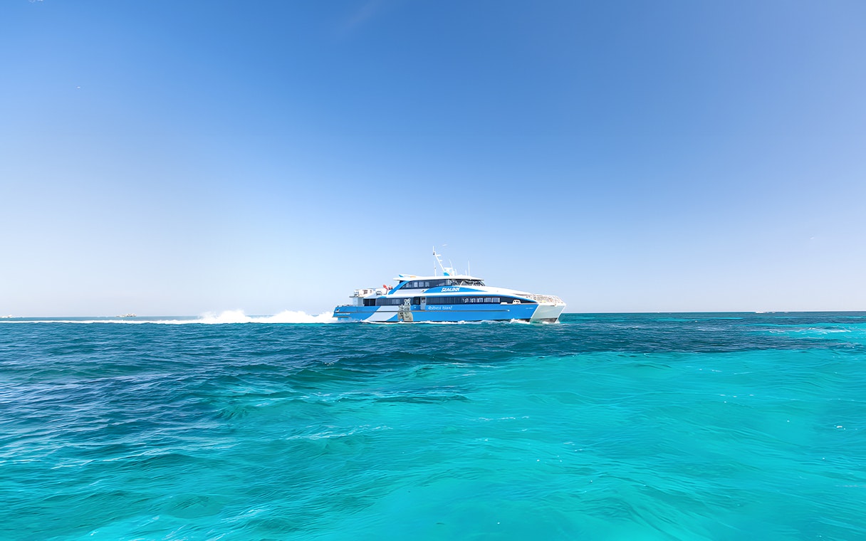 Ferry traveling across turquoise waters to Rottnest Island from Perth or Fremantle.