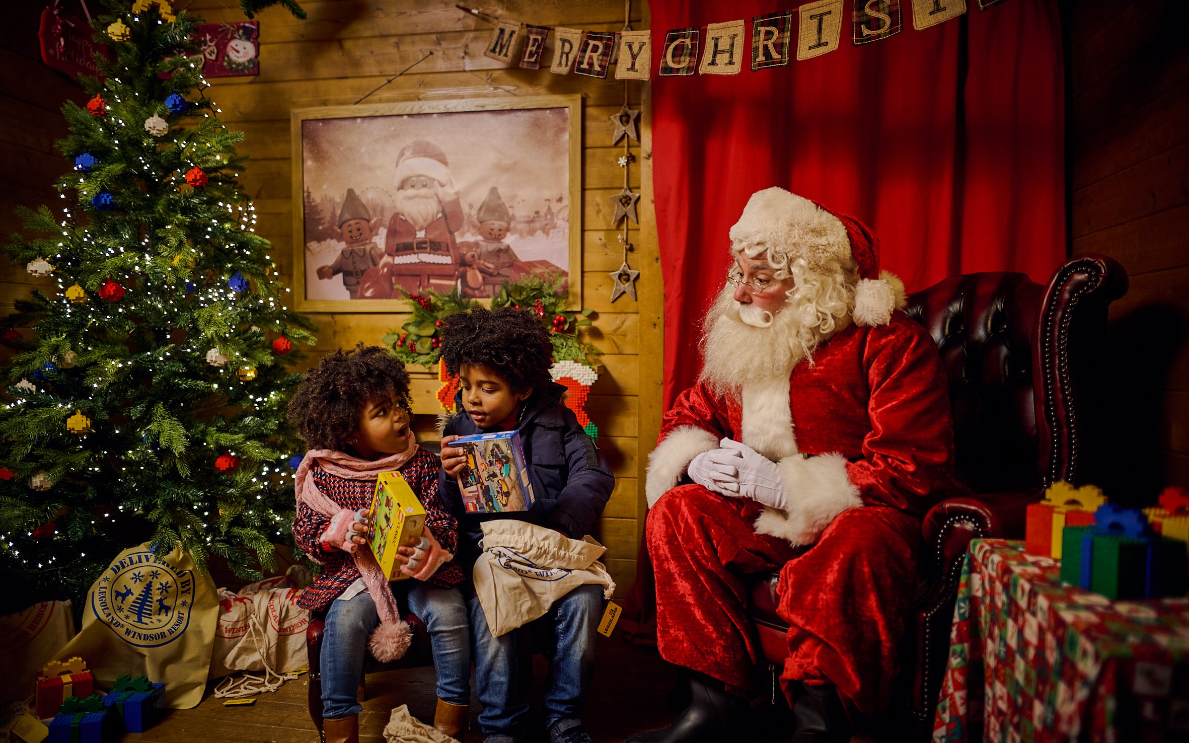 Children meeting Santa Claus at Legoland Windsor during Christmas.