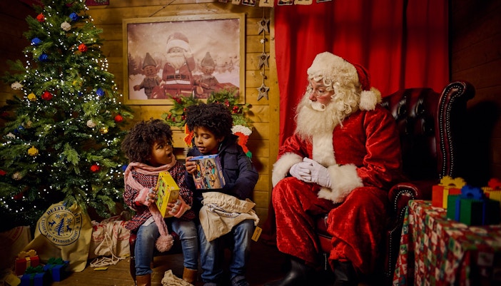 Children meeting Santa Claus at Legoland Windsor during Christmas.