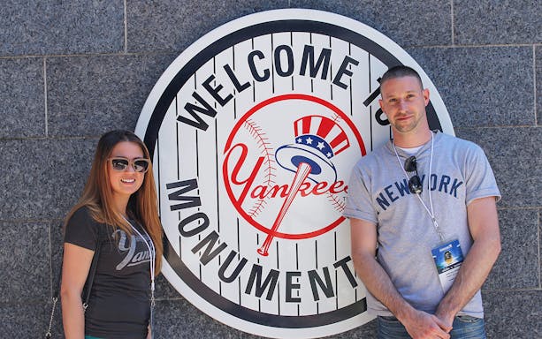 Visitors at Yankee Stadium's Monument Park before New York Yankees vs Arizona Diamondbacks game.