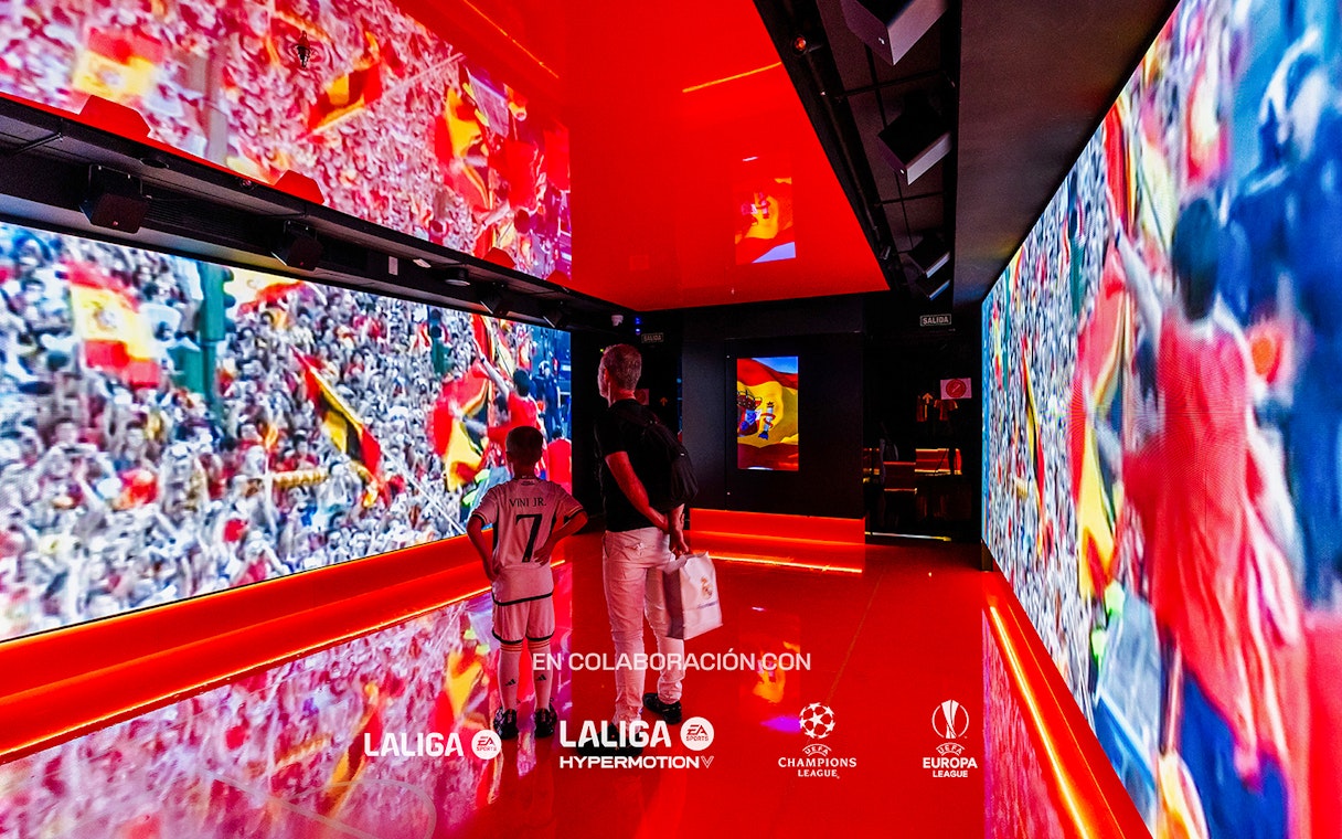 Visitors viewing football exhibits at Legends: The Home of Football Museum.