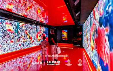 Visitors viewing football exhibits at Legends: The Home of Football Museum.