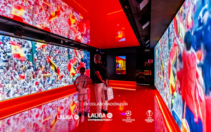 Visitors viewing football exhibits at Legends: The Home of Football Museum.