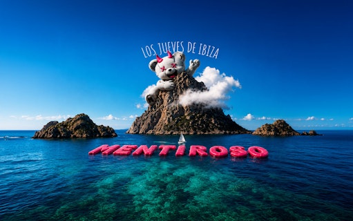 Mentiroso event promotion with a giant bear on a rocky island in Ibiza.