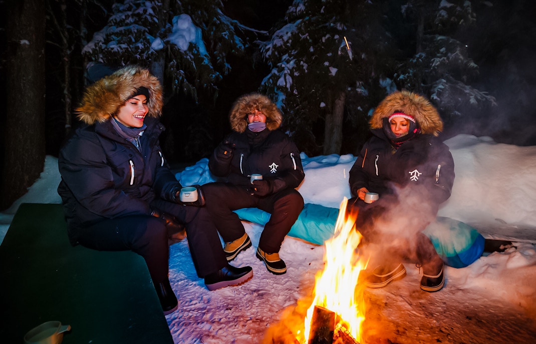 tourist sitting in camfire