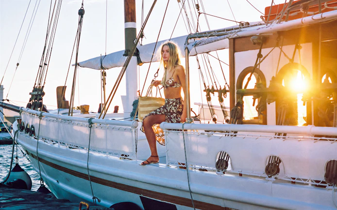 Guest enjoying sunset on a cruise ship deck in Corfu.