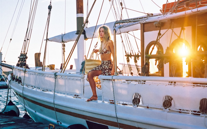 Guest enjoying sunset on a cruise ship deck in Corfu.