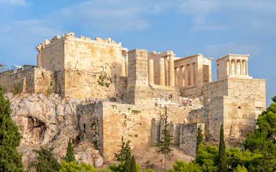 Acropolis in Athens during a guided bike tour, showcasing ancient ruins and architecture.