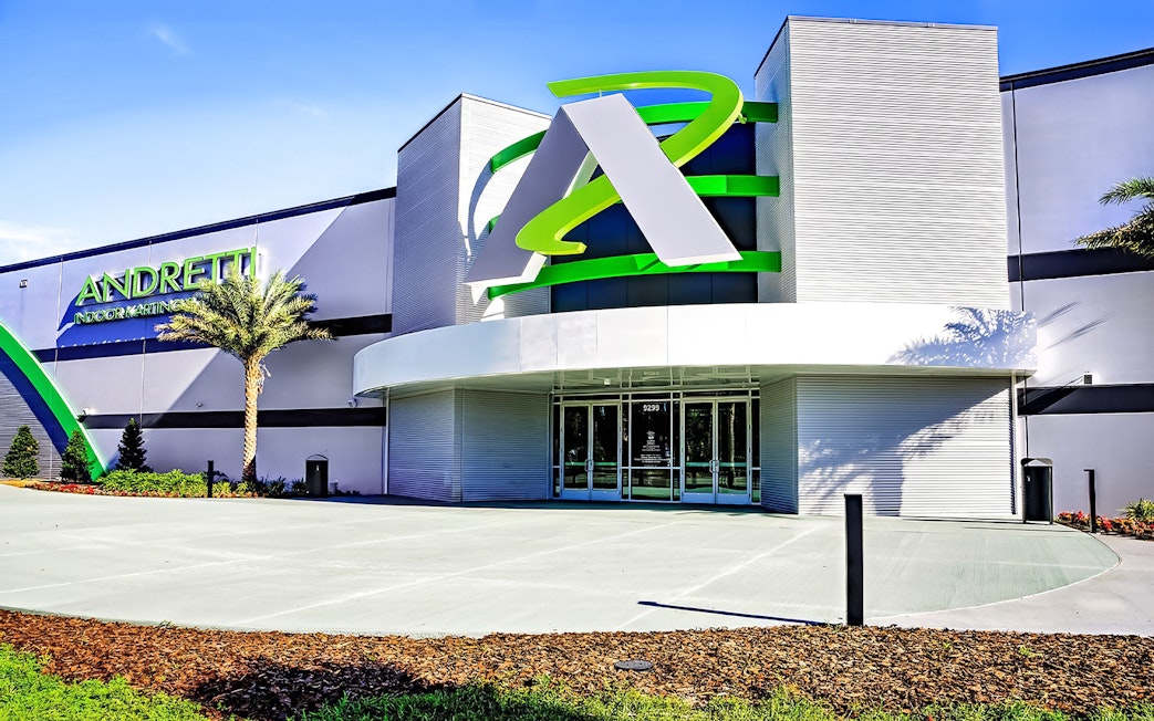 Andretti Indoor Karting entrance in Orlando with modern architecture.