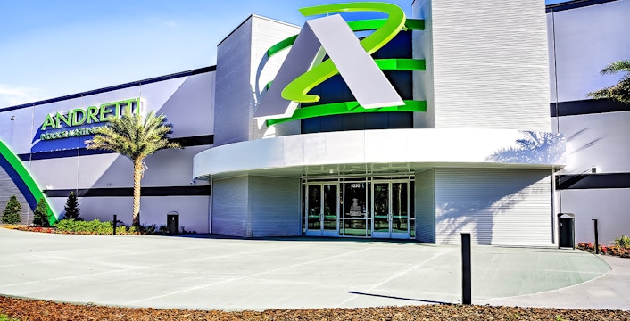 Andretti Indoor Karting entrance in Orlando with modern architecture.