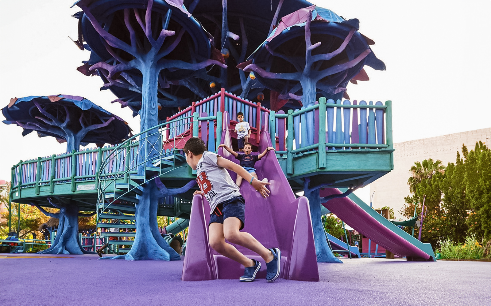 Children enjoying a ride at Fountain of Youth, Isla Mágica, Seville.