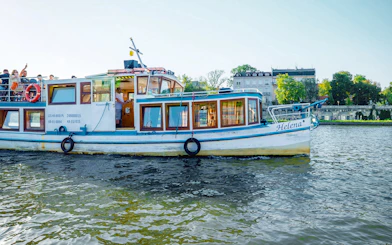 Tour boat on Vistula River during Cracow city tour.