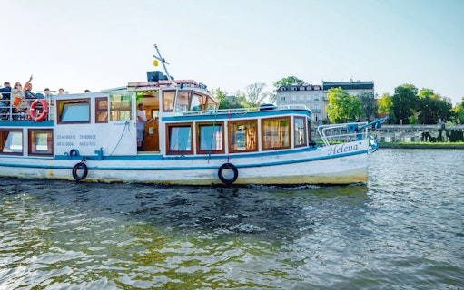 Tour boat on Vistula River during Cracow city tour.