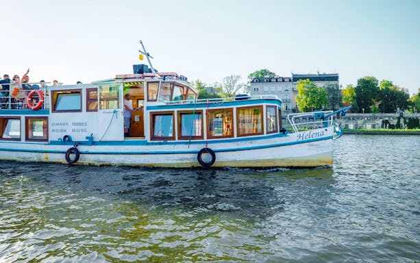 Tour boat on Vistula River during Cracow city tour.