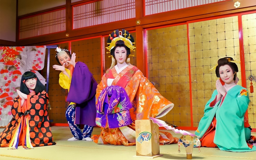 Performers in traditional Japanese attire at Noboribetsu Date Jidaimura.