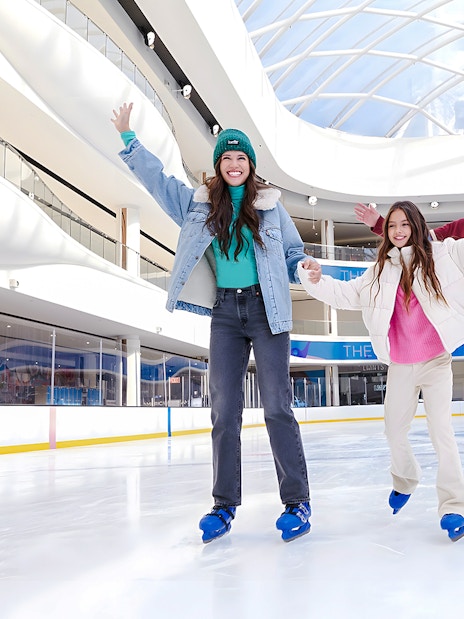 Family ice skating at the American Dream ice rink.