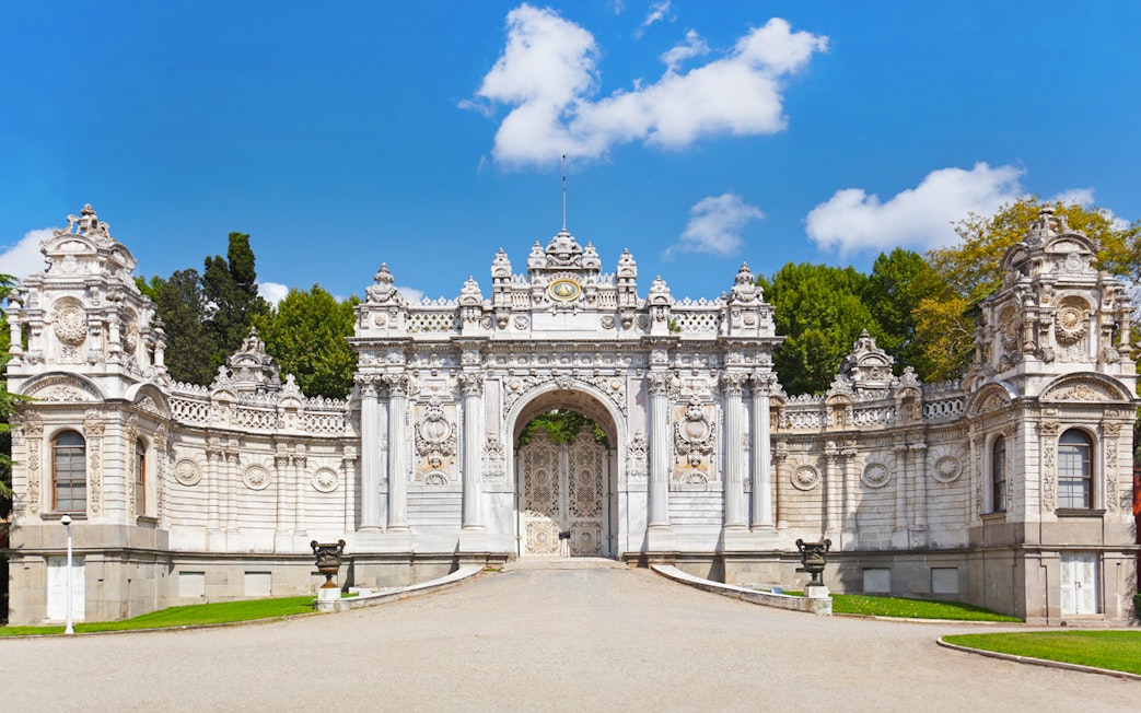 Exit gate of Dolmabahce Palace with ornate architecture, Istanbul, Turkey.