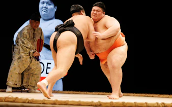 Sumo wrestlers competing at Sumo Hall Hirakuza Osaka.
