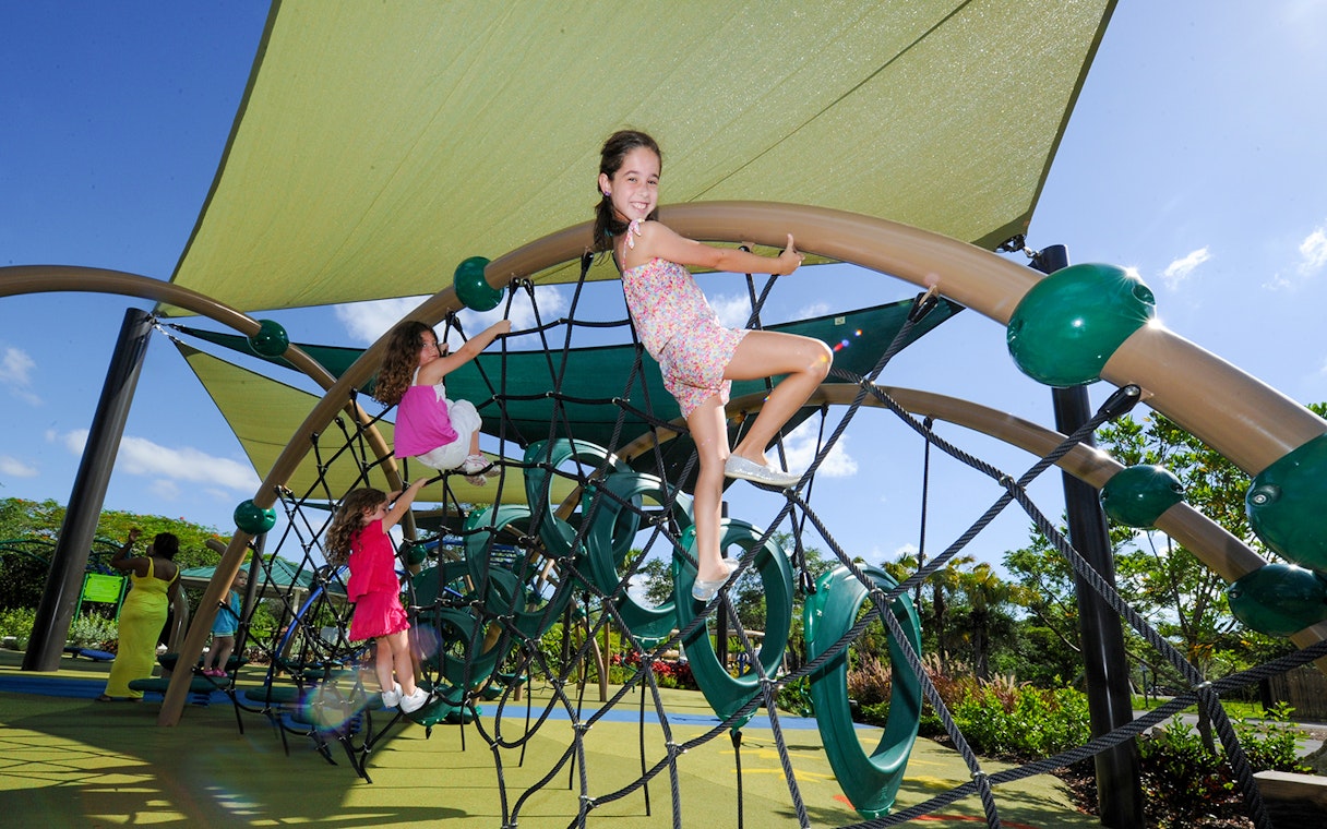 Children climbing play structure at Playworld Playground, Zoo Miami.