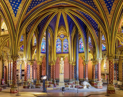 Lower Chapels in Sainte Chapelle with colorful stained glass and ornate arches, Paris, France.