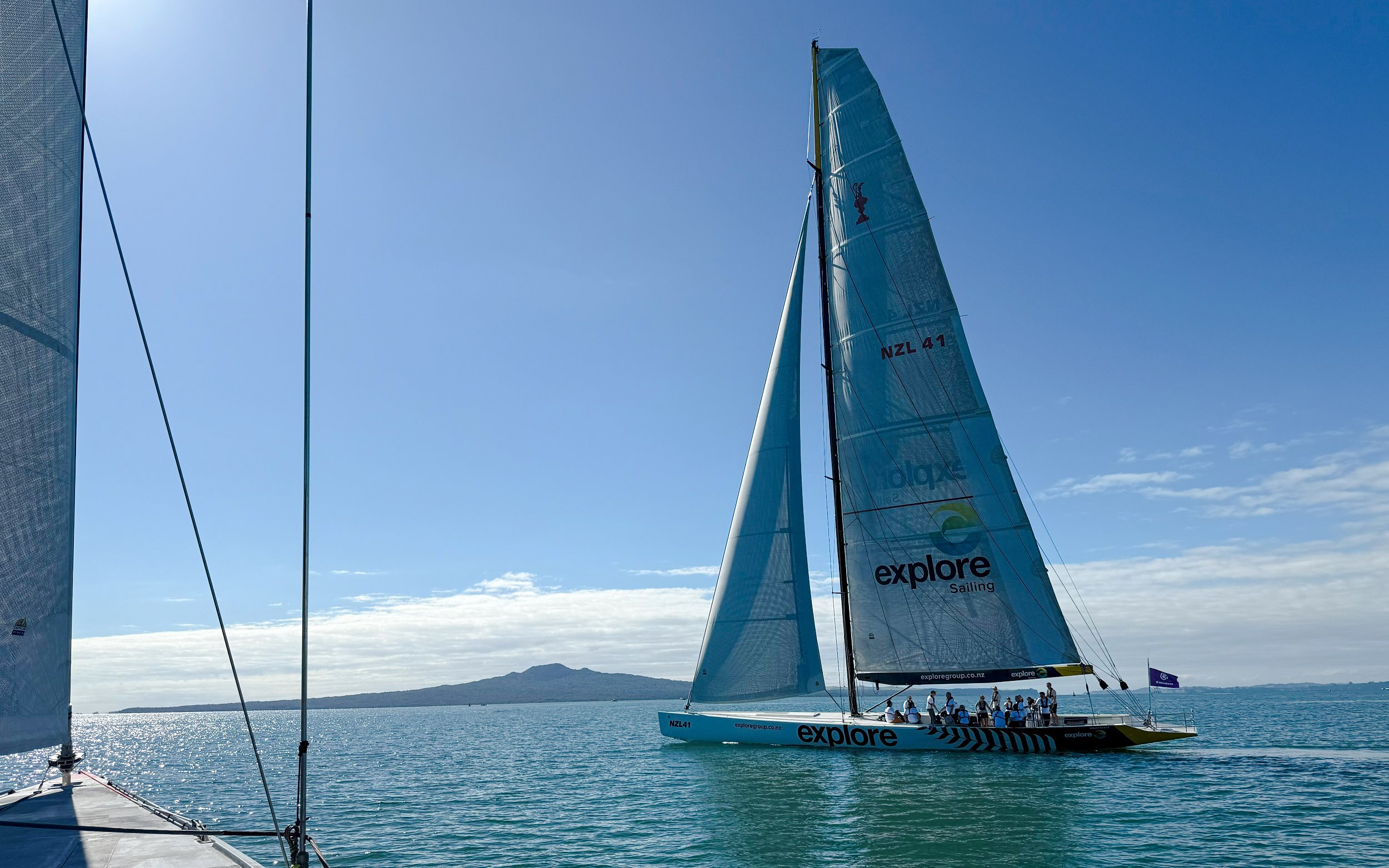 Sailing yacht on Auckland's Waitemata Harbour during America's Cup experience.