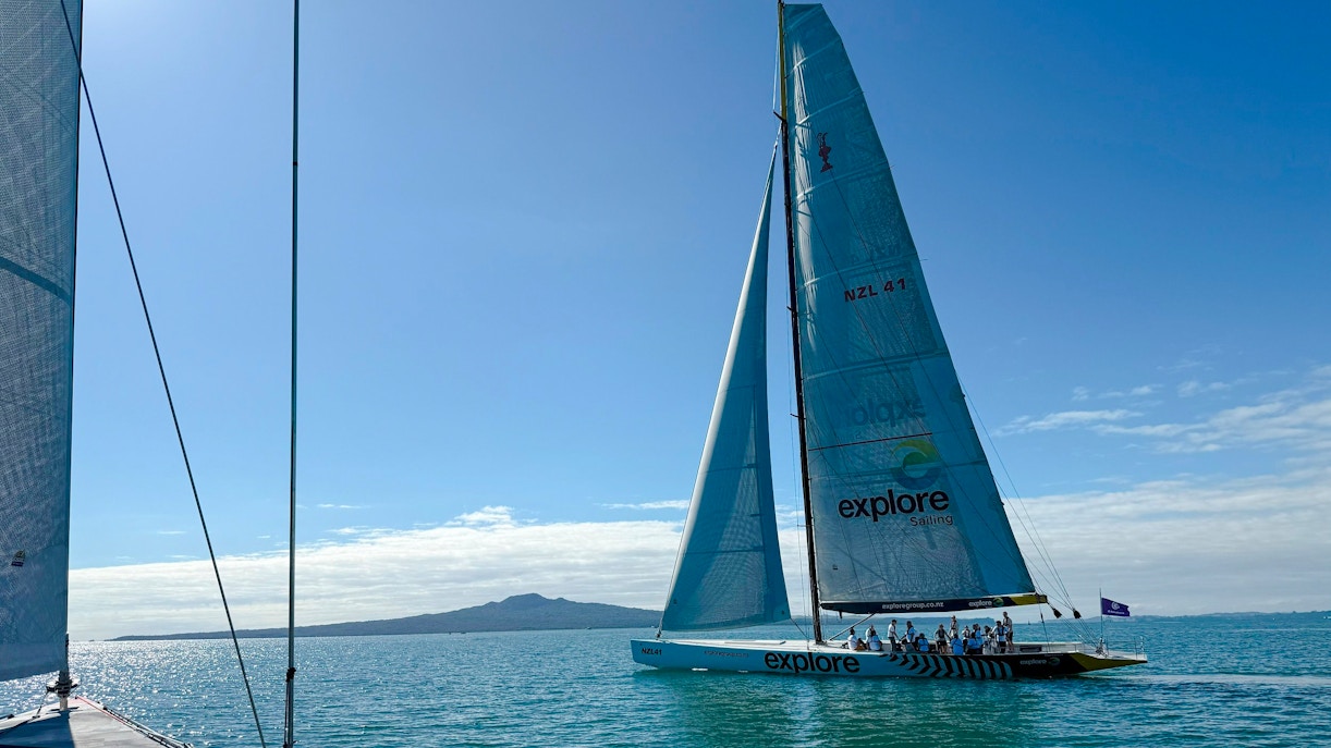Sailing yacht on Auckland's Waitemata Harbour during America's Cup experience.