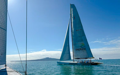Sailing yacht on Auckland's Waitemata Harbour during America's Cup experience.