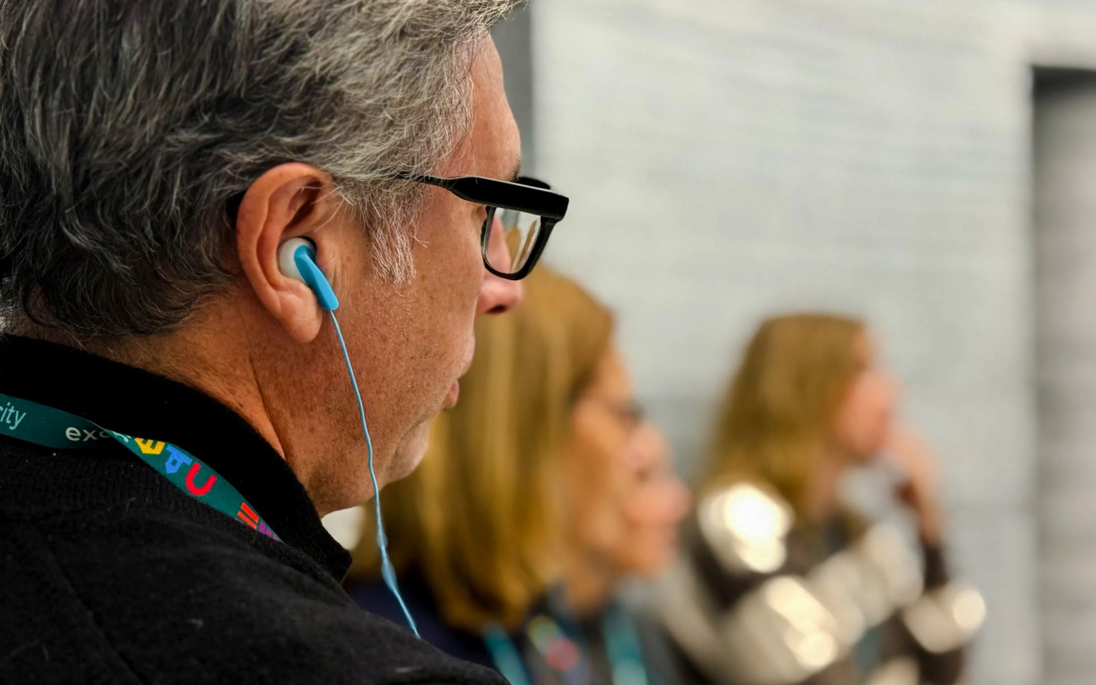 Guests using audio guides inside Oskar Schindler’s Factory.