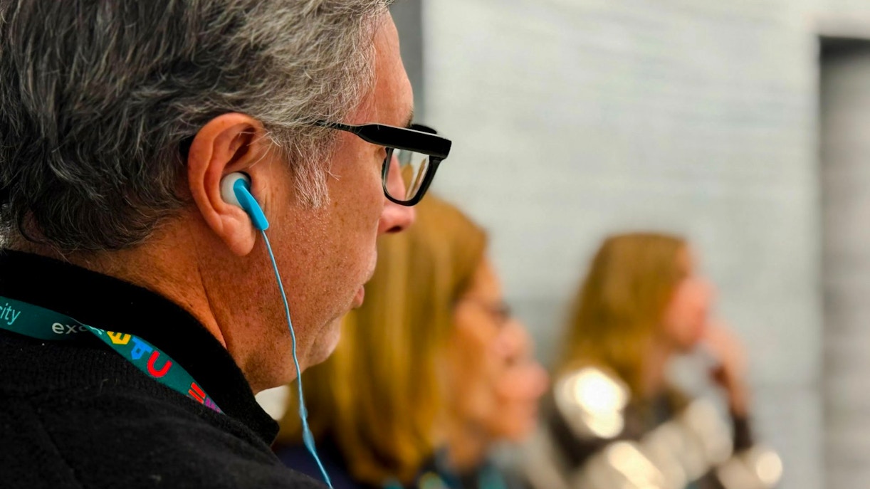 Guests using audio guides inside Oskar Schindler’s Factory.