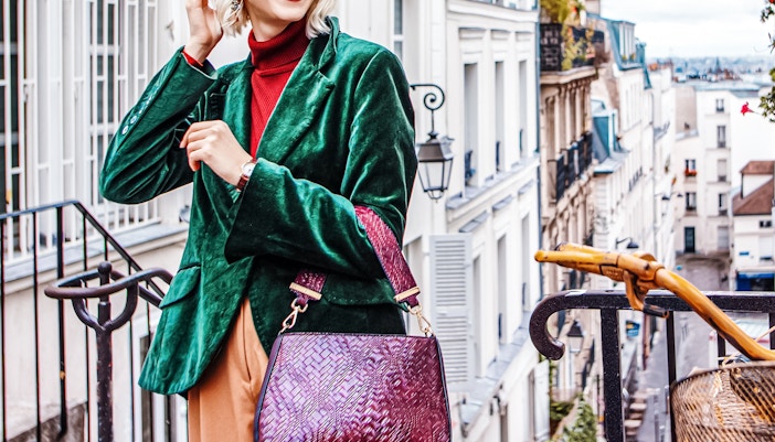 Woman with antique leather bag
