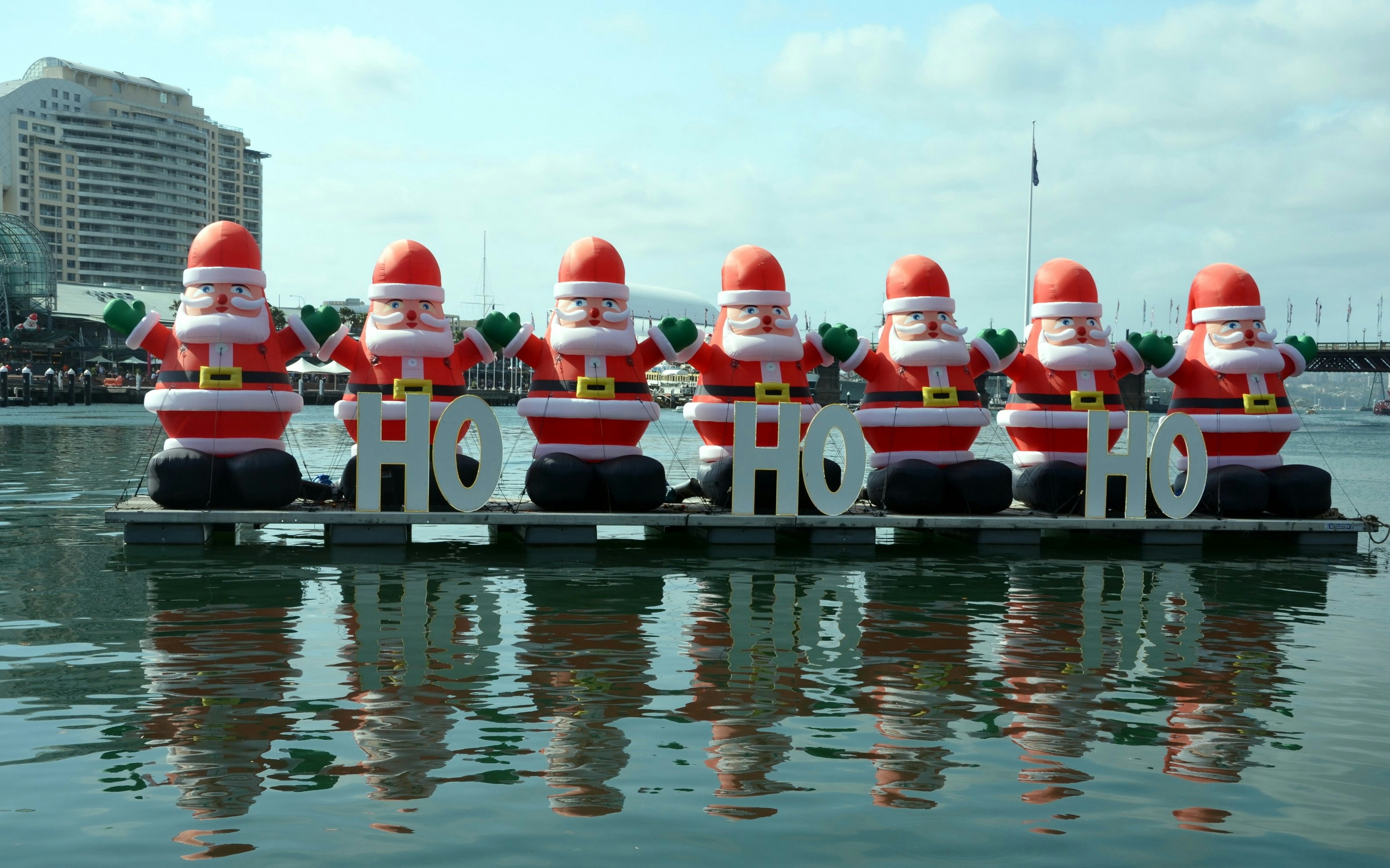 A bunch of inflated Santa Claus are decorating the Darling Harbour area in downtown Sydney during the Christmas holidays.