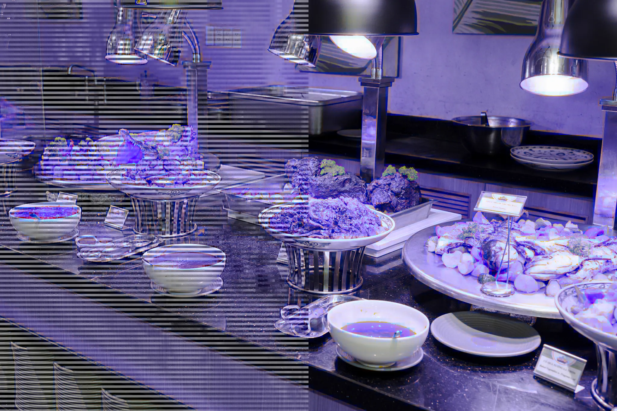 Buffet spread with seafood and dishes on Phu Quoc Hon Thom Cable Car Tour.