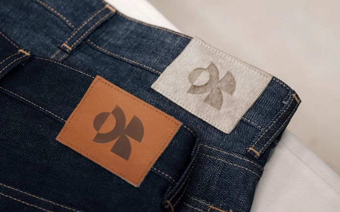 Denim jeans with colorful labels at Harajuku, Tokyo Denim Jeans Making Experience.