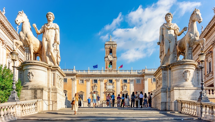 Capitoline Museums exterior in Rome, featuring ancient Roman sculptures.