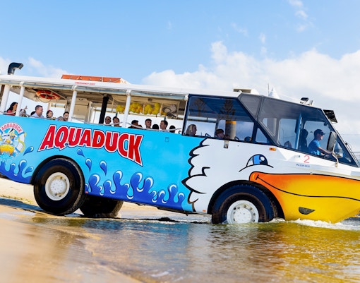 Aquaduck vehicle transitioning from land to water on a Gold Coast city tour.