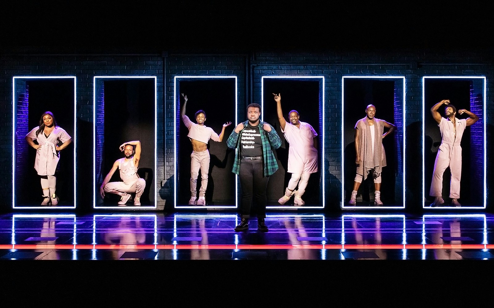 Performers on stage in "A Strange Loop" musical production.