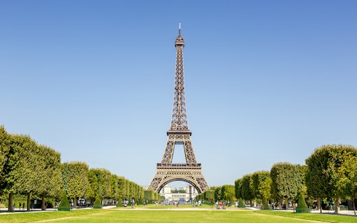 Eiffel Tower with surrounding gardens in Paris, France.