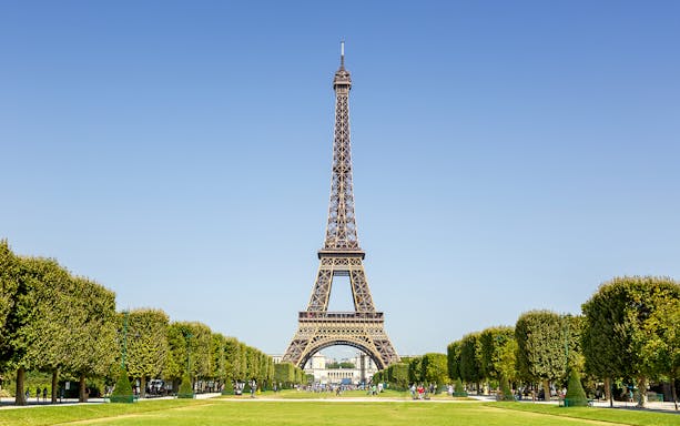 Eiffel Tower with surrounding gardens in Paris, France.