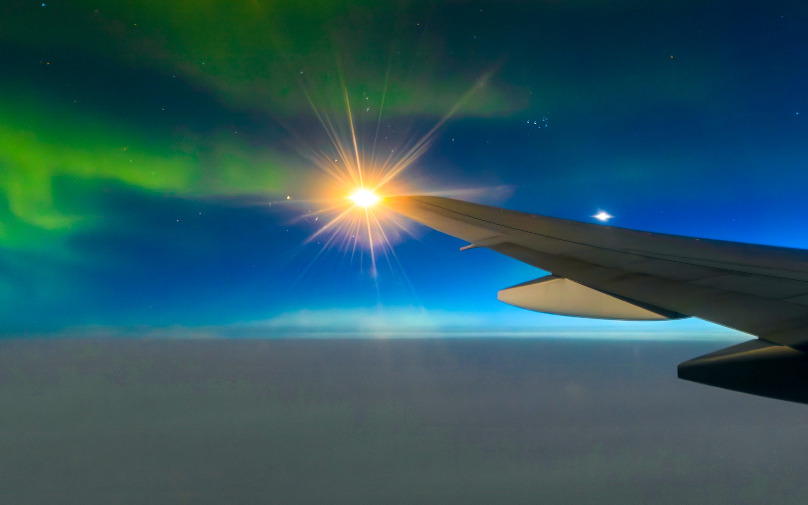 northern lights from airplane window